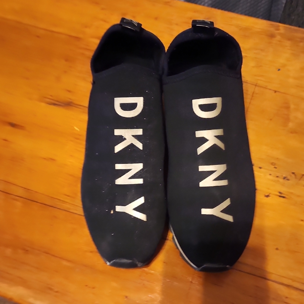 DKNY Womens Black Slip-On Sneakers with Rose Gold Logo